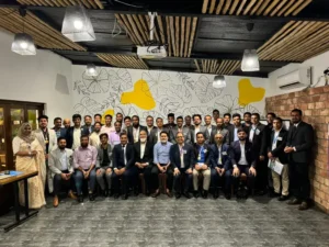 Ain Bisharod with business and legal professionals at a networking event in Dhaka